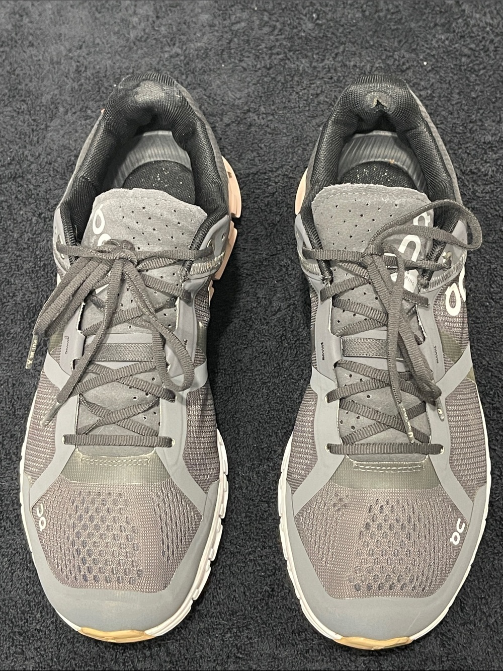 On Cloud Dark Gray and Pink Athletic Running Shoes